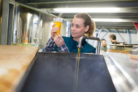 pretty female brewery at work
