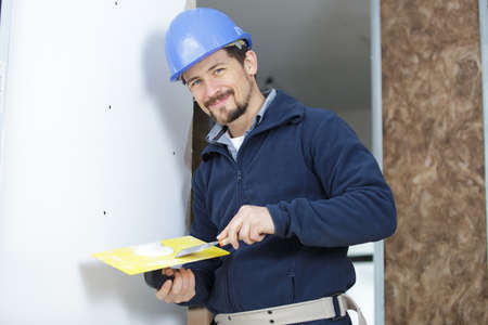 portrait of male plasterer on siteの写真素材