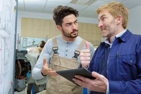 manager and worker discussing somethingの写真素材