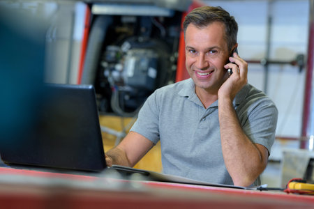 man talking on the phone at the office