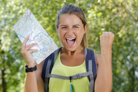 a very exicted hiker woman