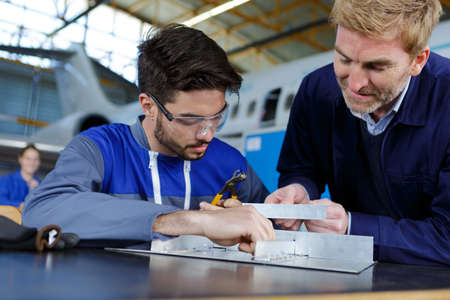 mechanic and flight engineer at workの写真素材