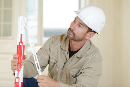 man builder looking at something