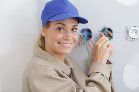 portrait of a female electricianの写真素材