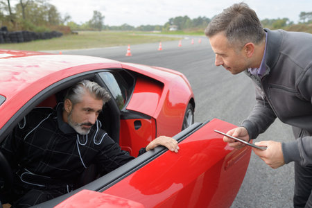 car driver testing a fast car