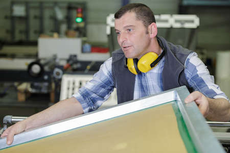 a male worker in factoryの写真素材