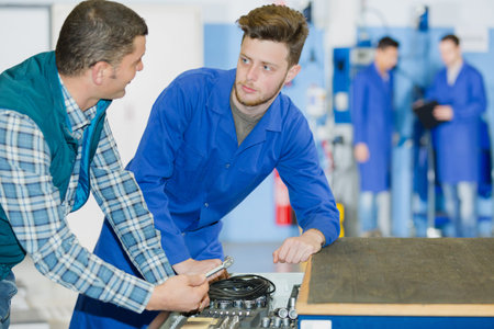 apprentice mechanic in auto shop