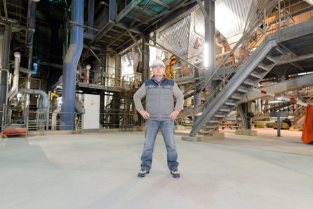 portrait of an industrial plant worker posing