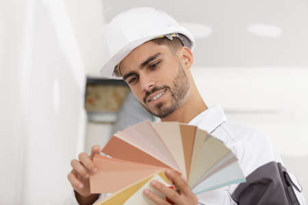 a builder choosing a colorの写真素材