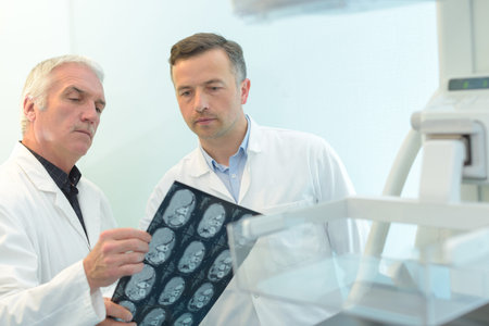 portrait of caucasian doctor check xray