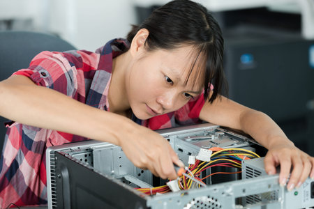 woman working on a broken processor