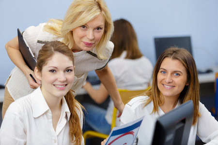 portrait of female students with teacher