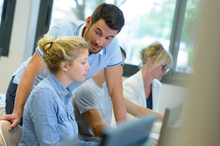 group of young people in a business school