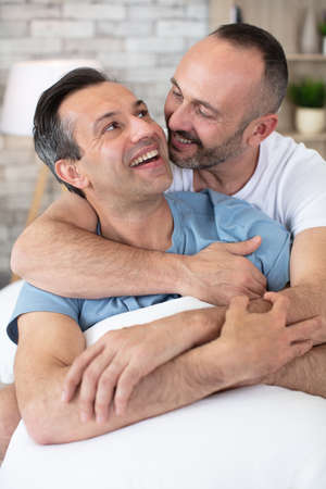 a lovely couple is huggingの写真素材
