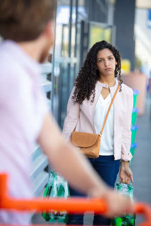 portrait of a tired exhausted at supermarketの写真素材