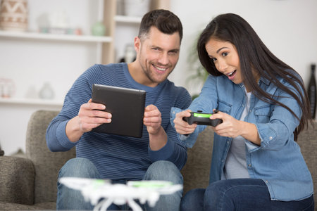 young couple playing video game