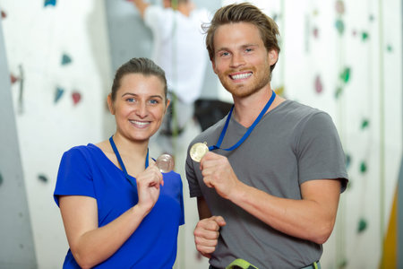 medal winners looking at camera
