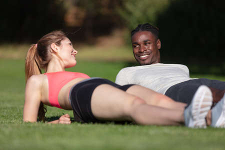 sporty couple practicing sport outdoorsの写真素材
