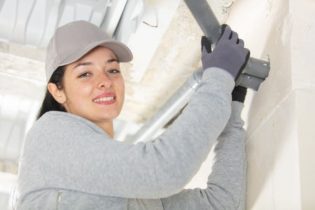 female construction site engineer smiling