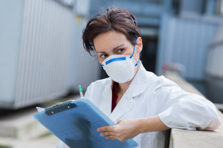 woman with safety protection gas mask
