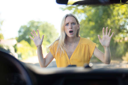 female during a road accidentの写真素材