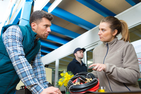 female engineer shows the problem to colleague