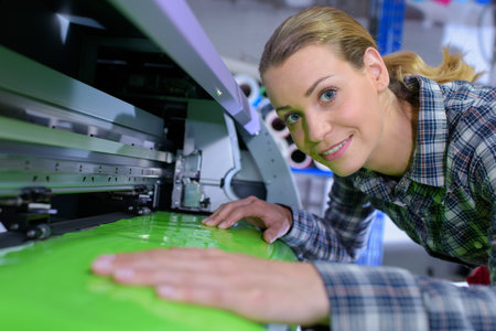 female printing technician at work