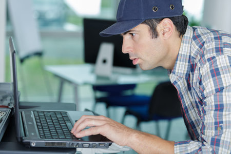 portrait of male technician indoors