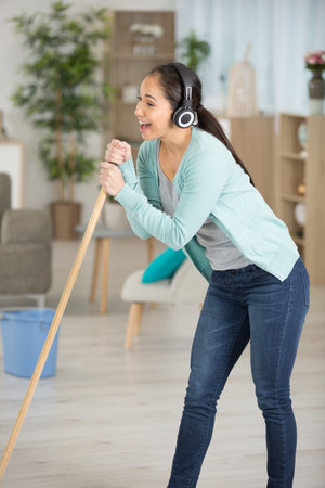 a beautiful cheerful hardworking lady singing