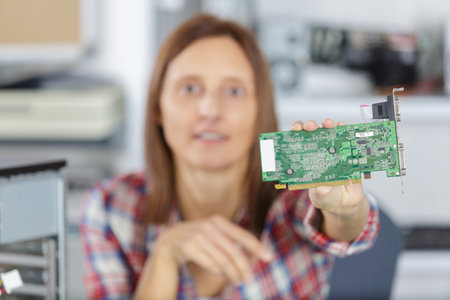 female worker showing a hard driveの写真素材