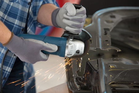 grinder worker uses a circular saw