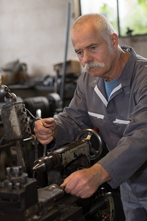 a machinist operating a machine