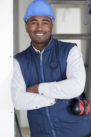 young male builder is posingの写真素材