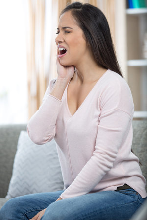 woman suffering from toothaches
