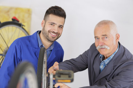 Portrait of two male mechanicsの写真素材