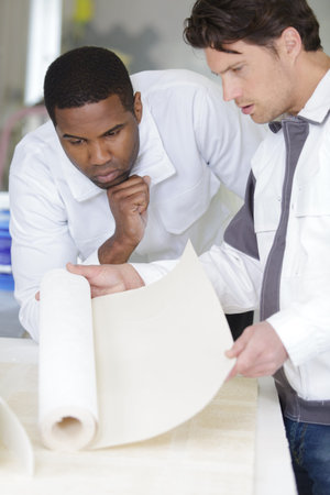 men repair building and people concept