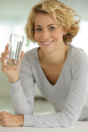 woman with glass of water