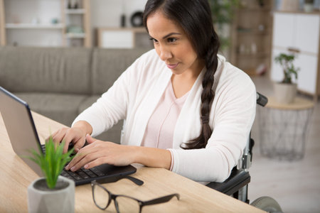 young disabled businesswoman at work