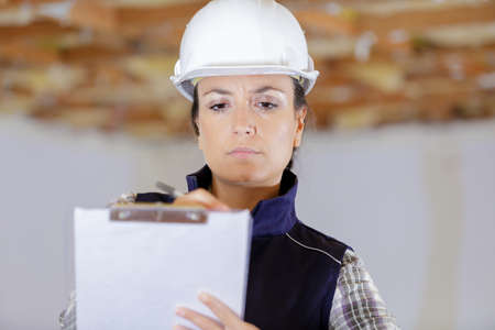 a serious woman construction workerの写真素材