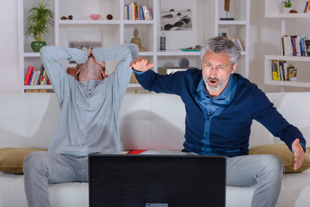 close up of family watching a game