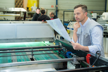 worker man at printing industry