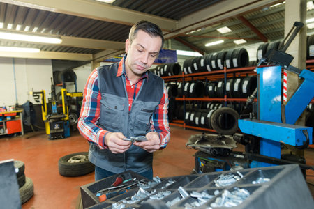 service man worker at factory workshop