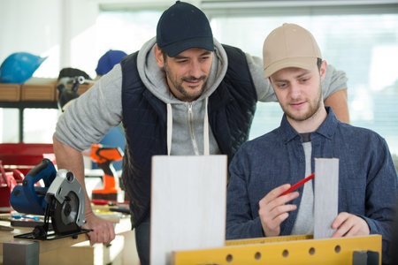 carpenters work in a studio