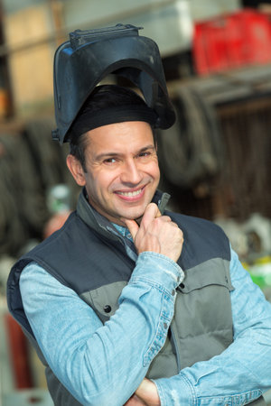 industrial welder worker at factory workshop