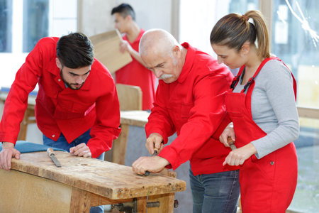 portrait of carpenters team at workshop