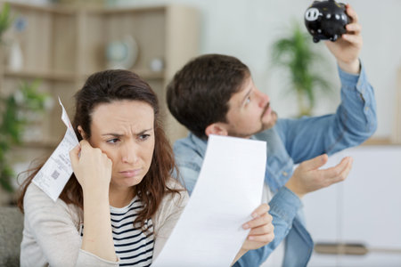 sad couple with finantial issues