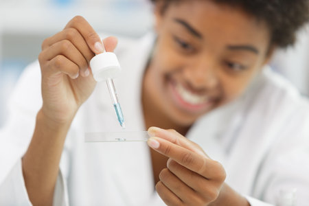 scientist making observation of the bottle of chemical