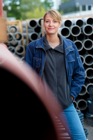 portrait of woman in materials yard