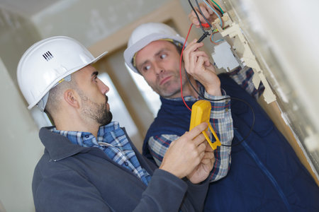 electrician checking the old wiring