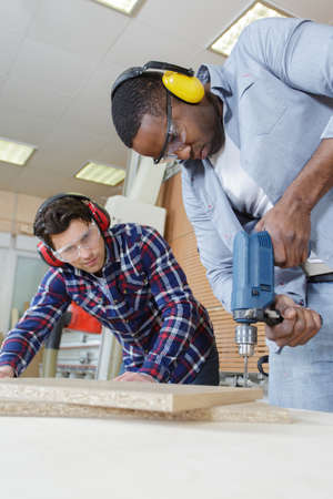 profession carpentry woodwork and people conceptの写真素材